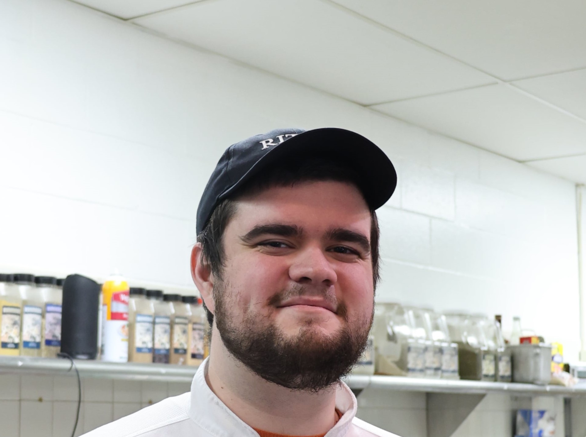 Chef Wood smiling while getting his picture taken. (RIT Dining)