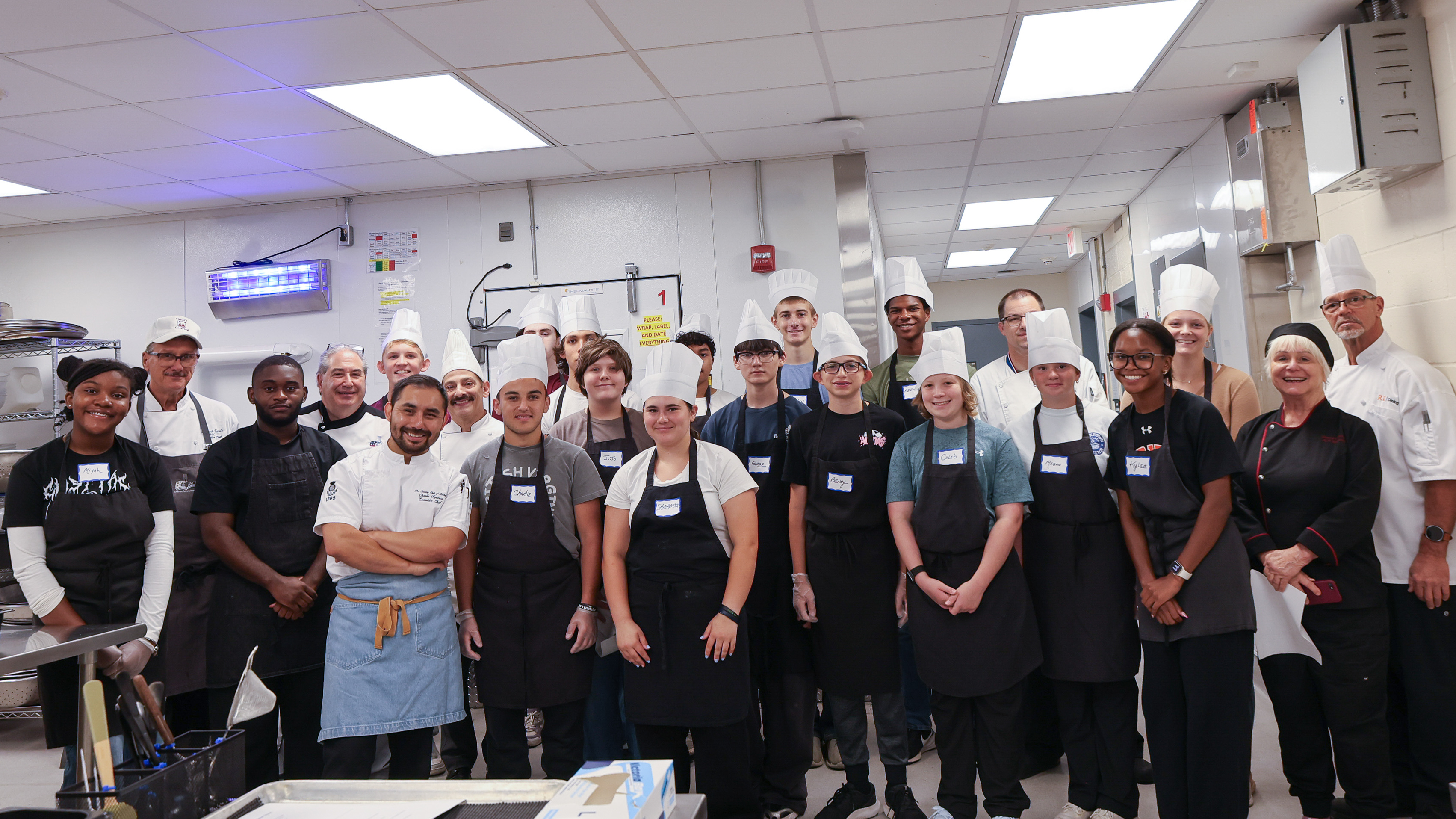 group of students in a kitchen