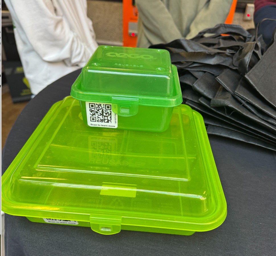 green container with QR code