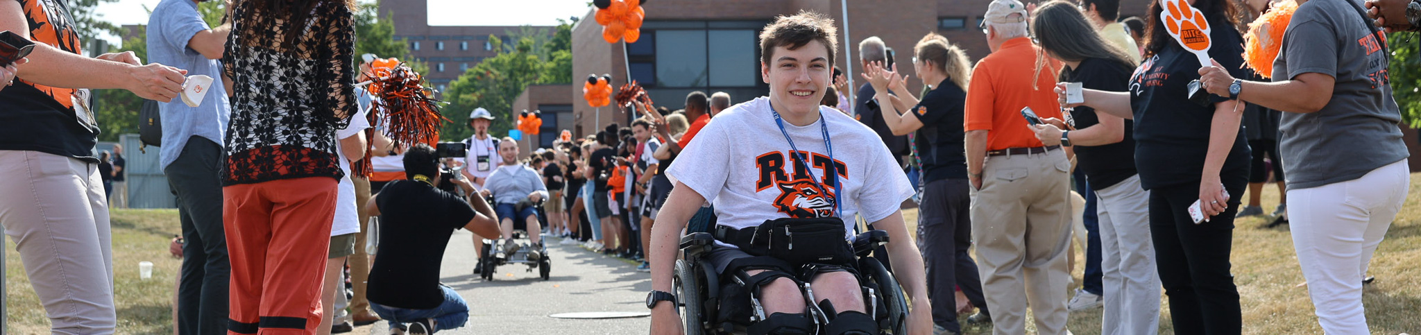 student in wheel chair at tiger walk