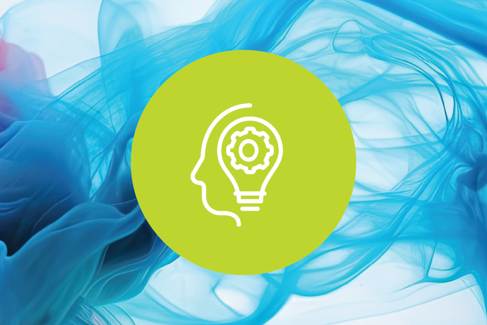 colored background with line drawing of head with gear in it