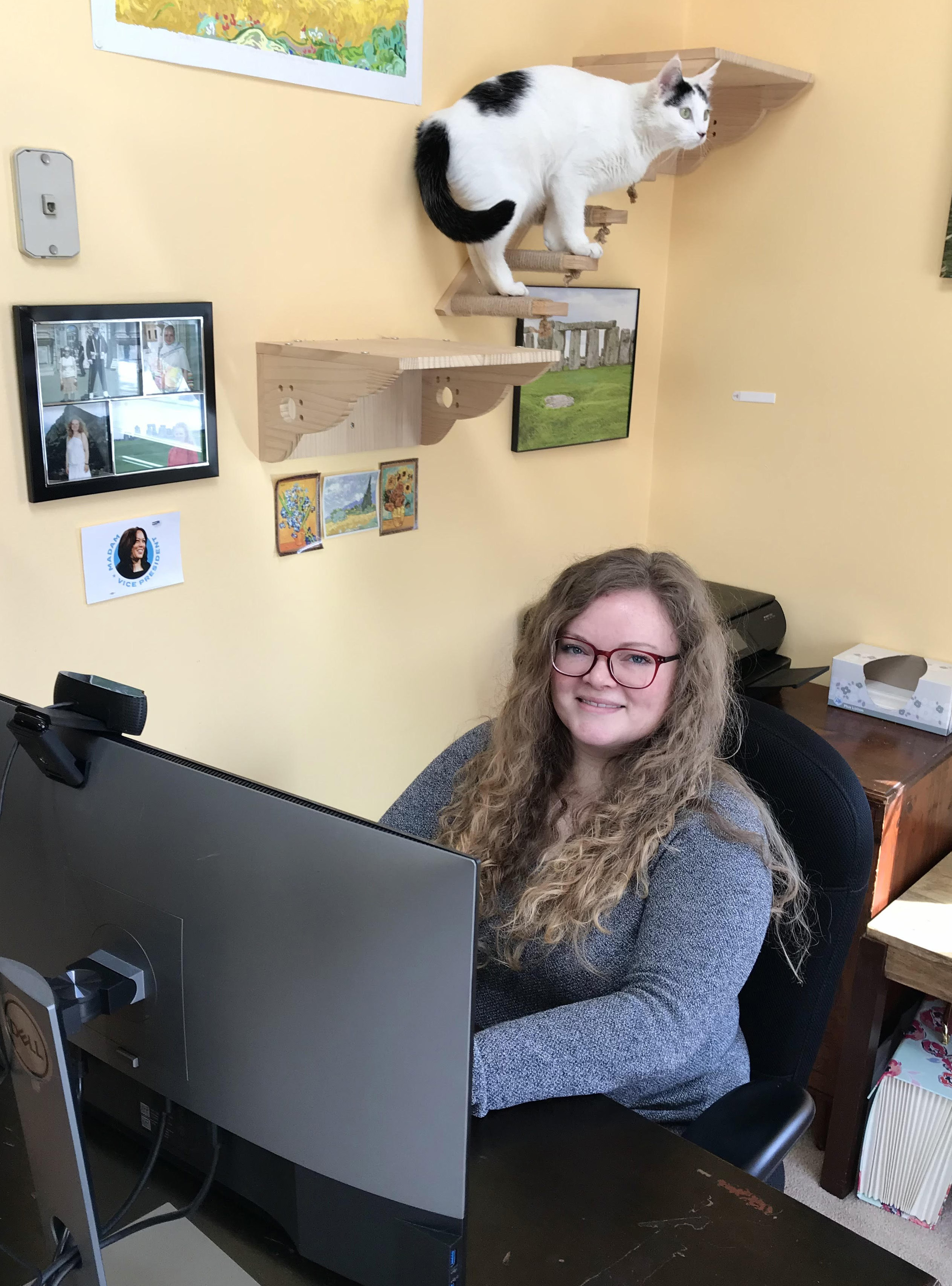 Christan sitting in office 