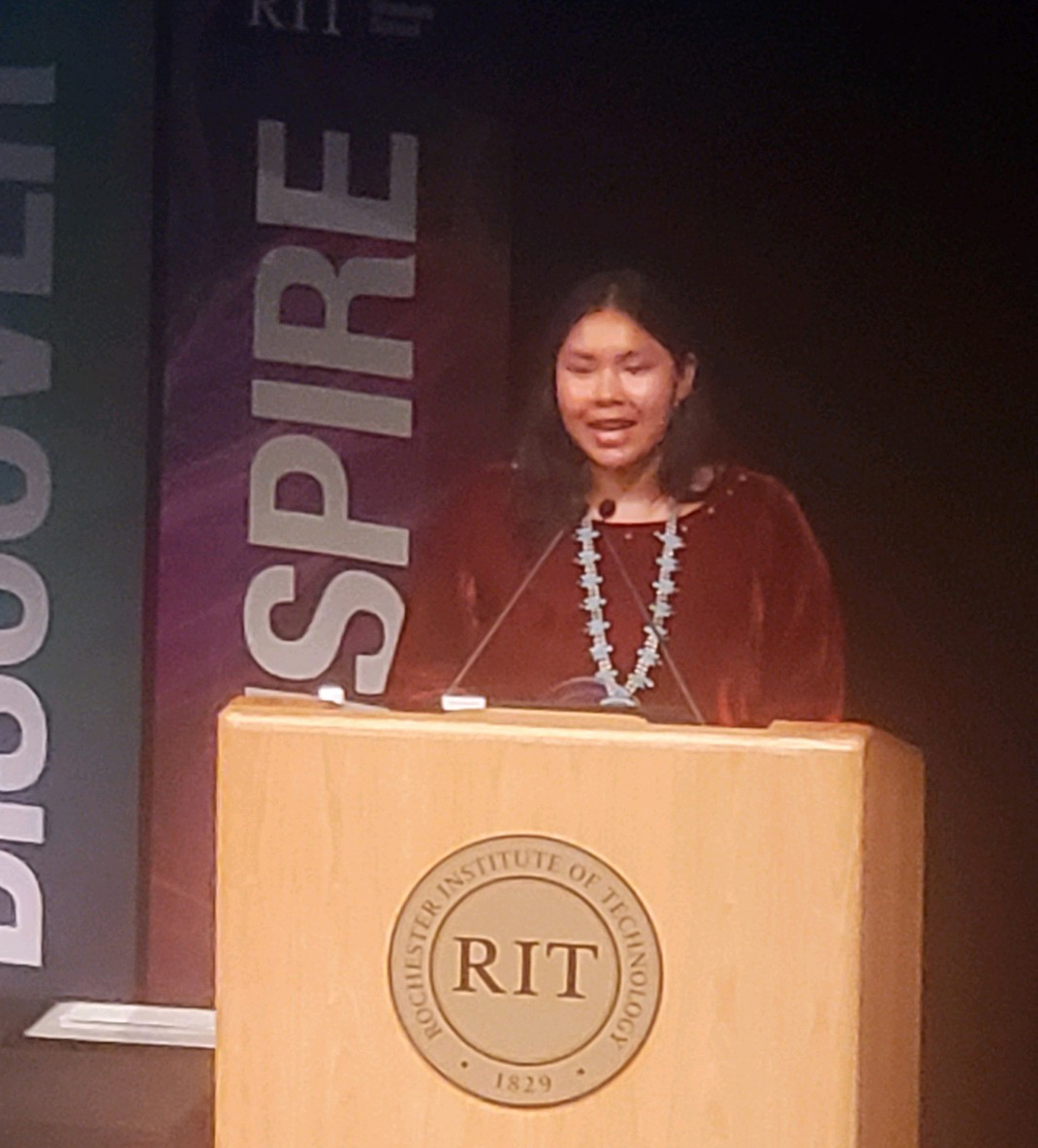 photo of student at podium