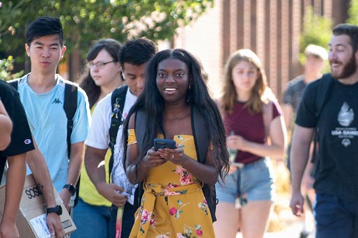 Students walking on the quarter mile