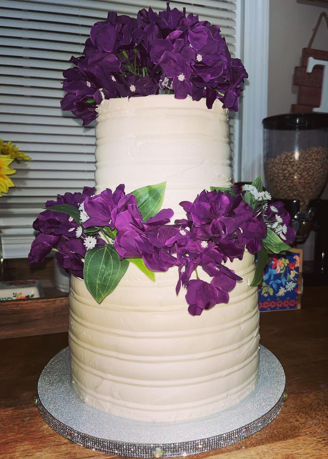 Tall white and purple cake