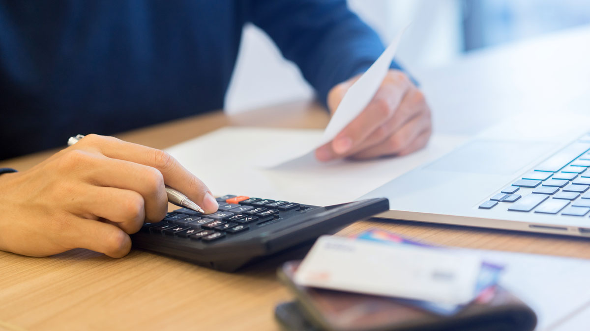 Accountant using calculator