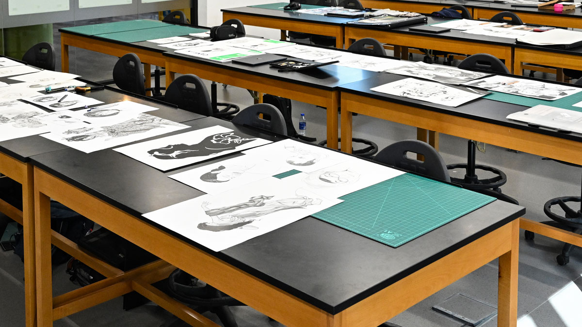 Drawings on a paper placed on the table