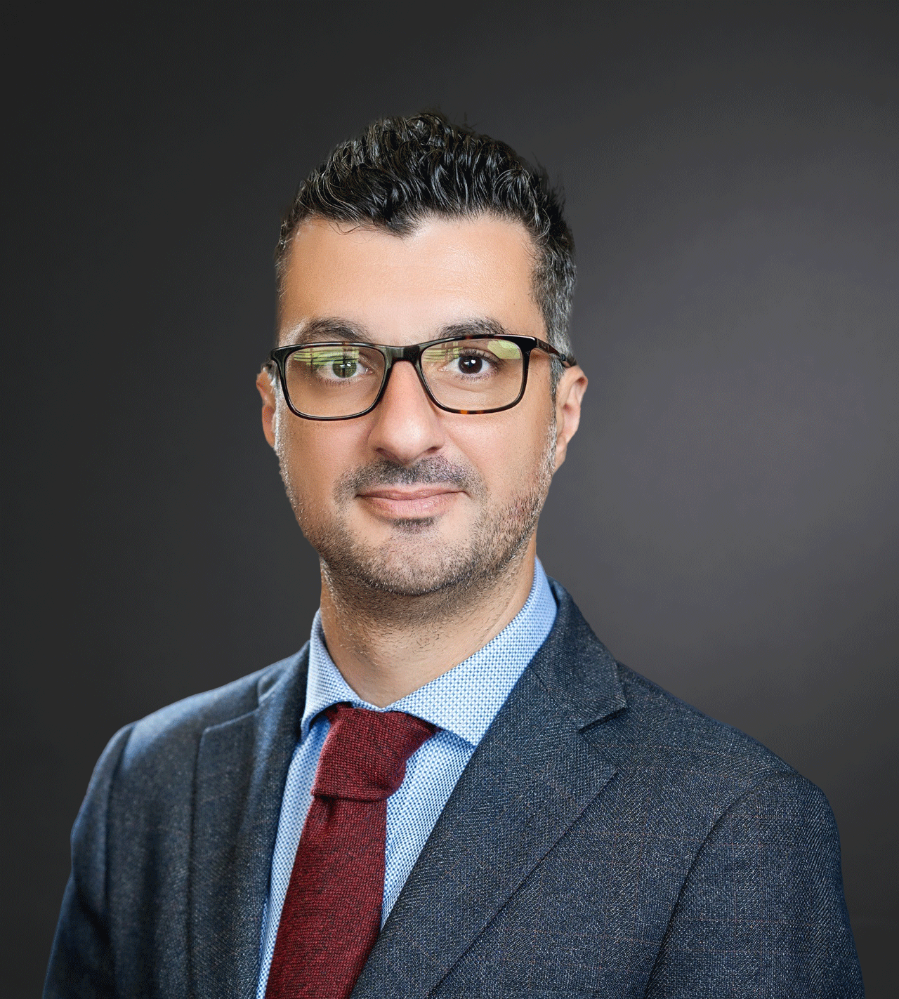 Headshot of Dr. Yacine Hadjiat
