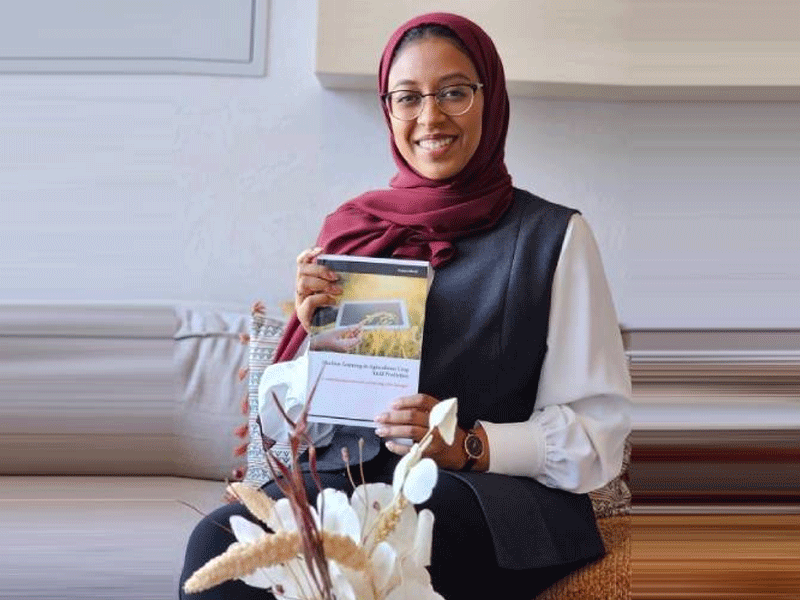 Student holding a book