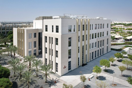 a building at RIT Dubai is shown in all white brick.