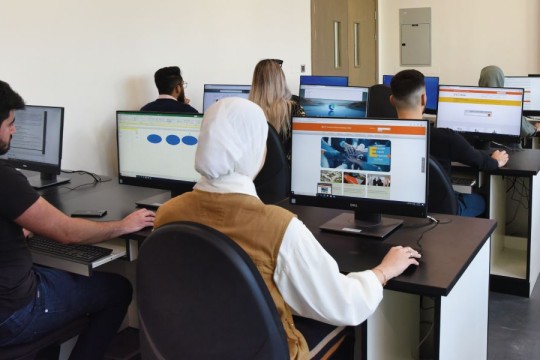 People working on computers