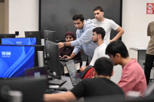 Students working on computers