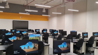 Computer lab with many windows desktop computers