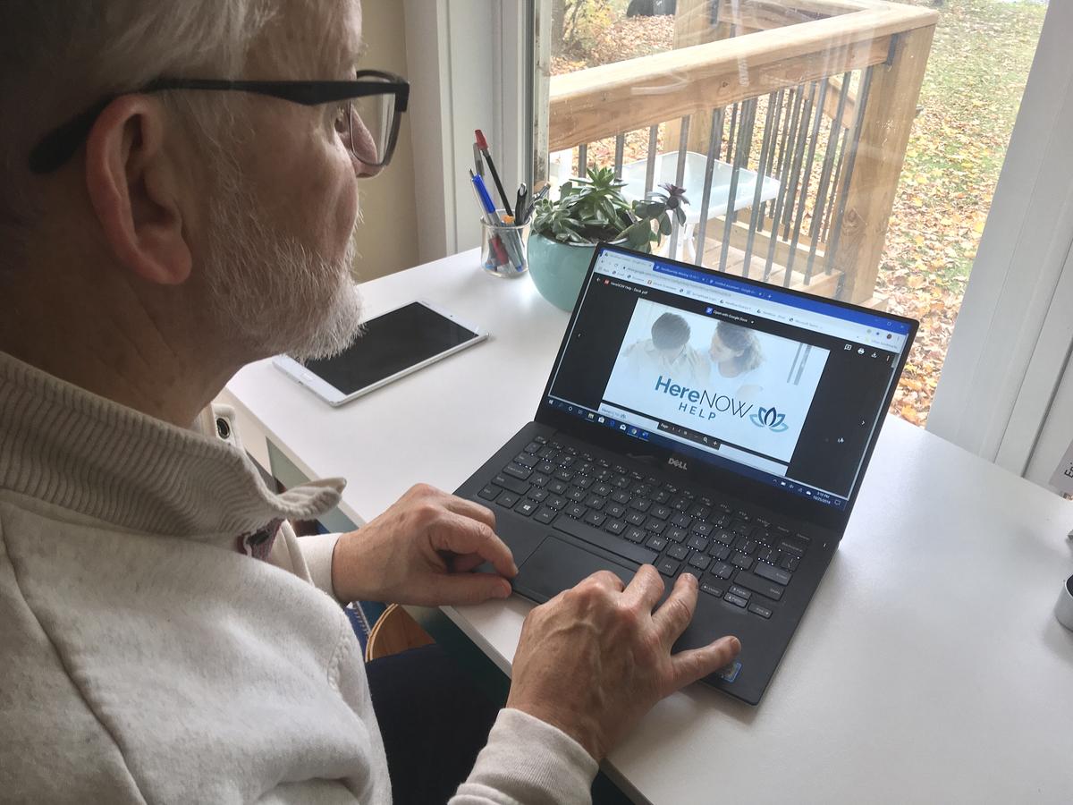 John Brennan shows a deck of slides about an app founded by his nephew, Bill Gerlach.