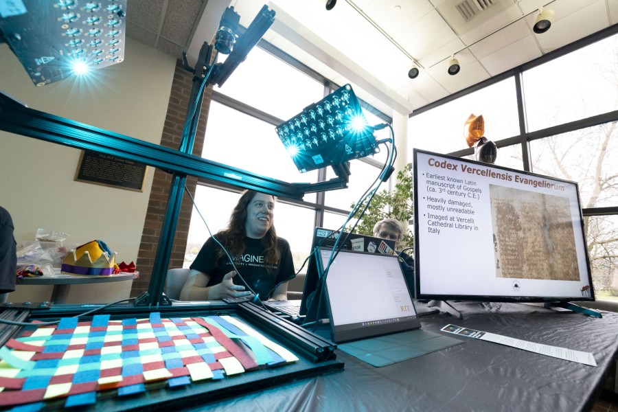 A second year museum studies student, exhibiting historical artifacts