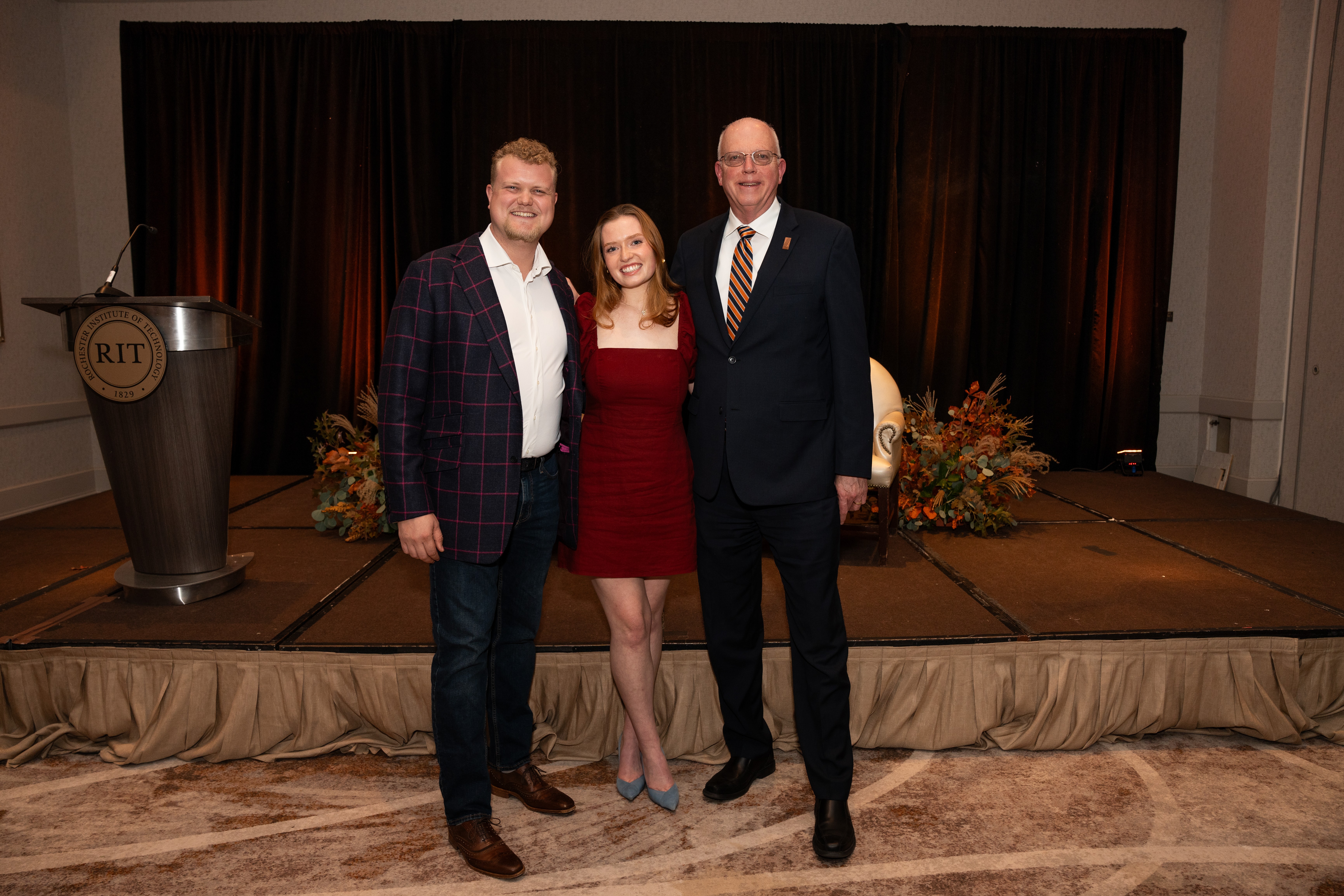 Three people posing for a picture