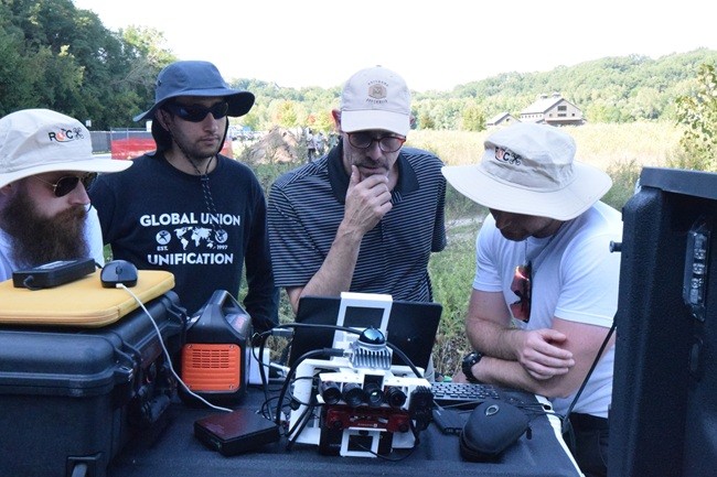 Sagar Lekhak with advisor Emmett Ientilucci with collaborators from Royal Military Academy of Belgium analyzing the data collected in research