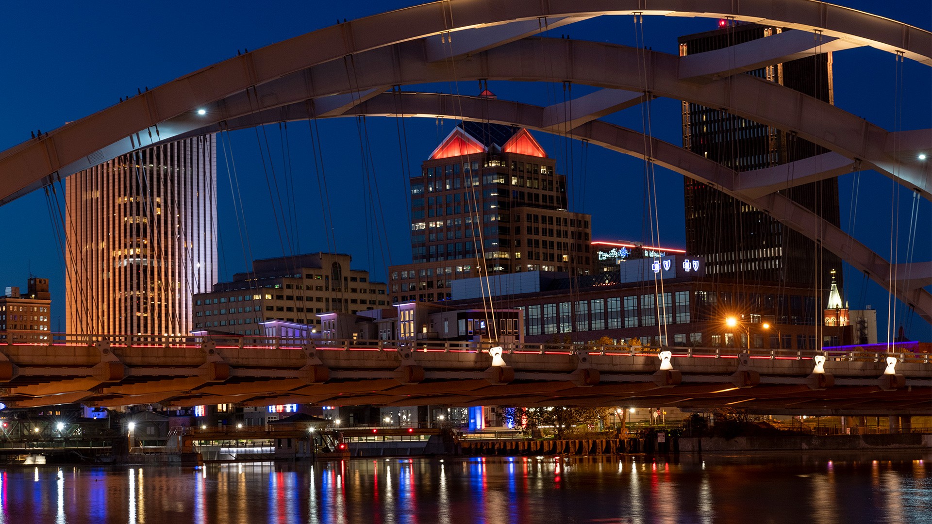 A photo of the Rochester city skyline lit up at night