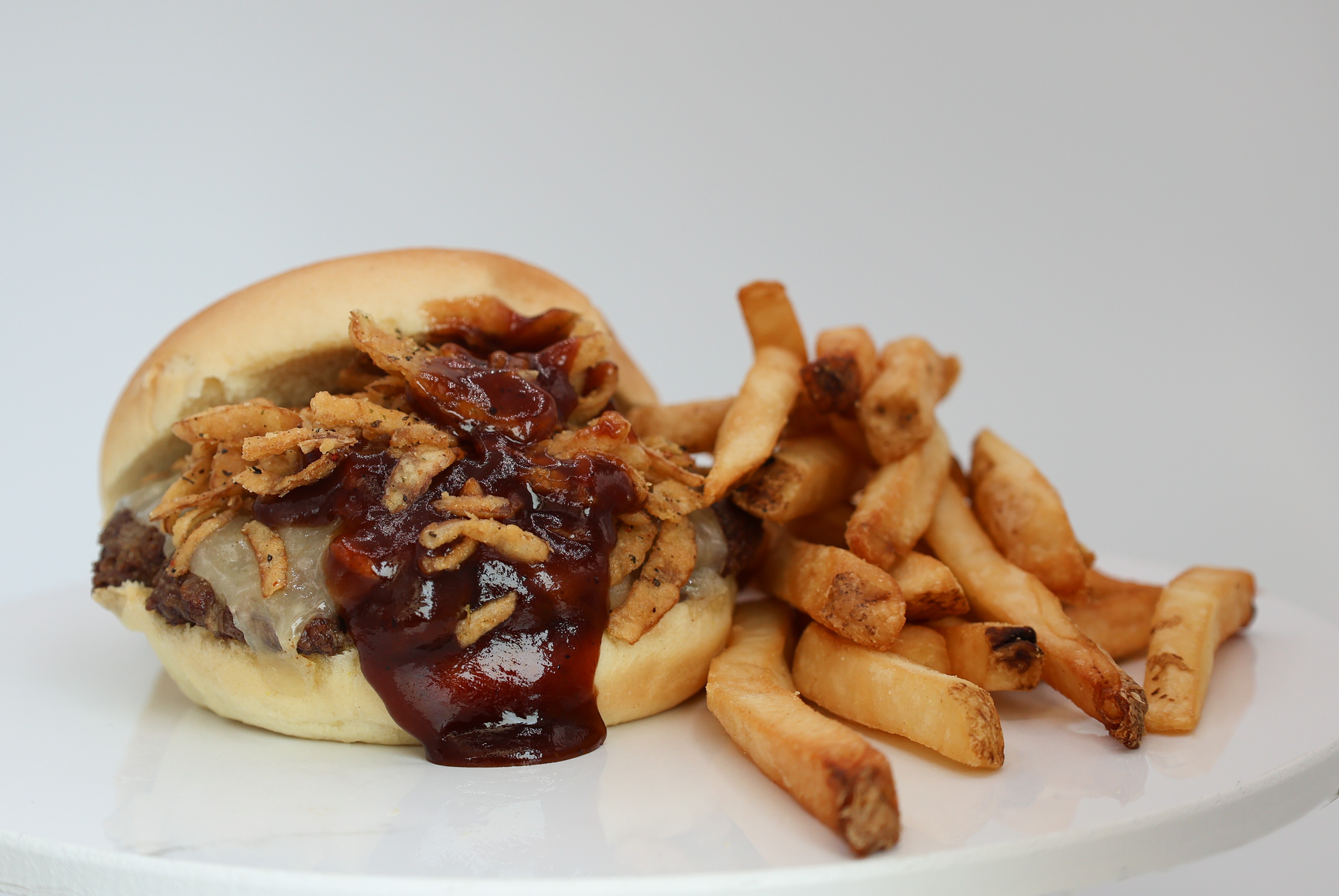 RIT Dining food truck, gourmet burger with French fries
