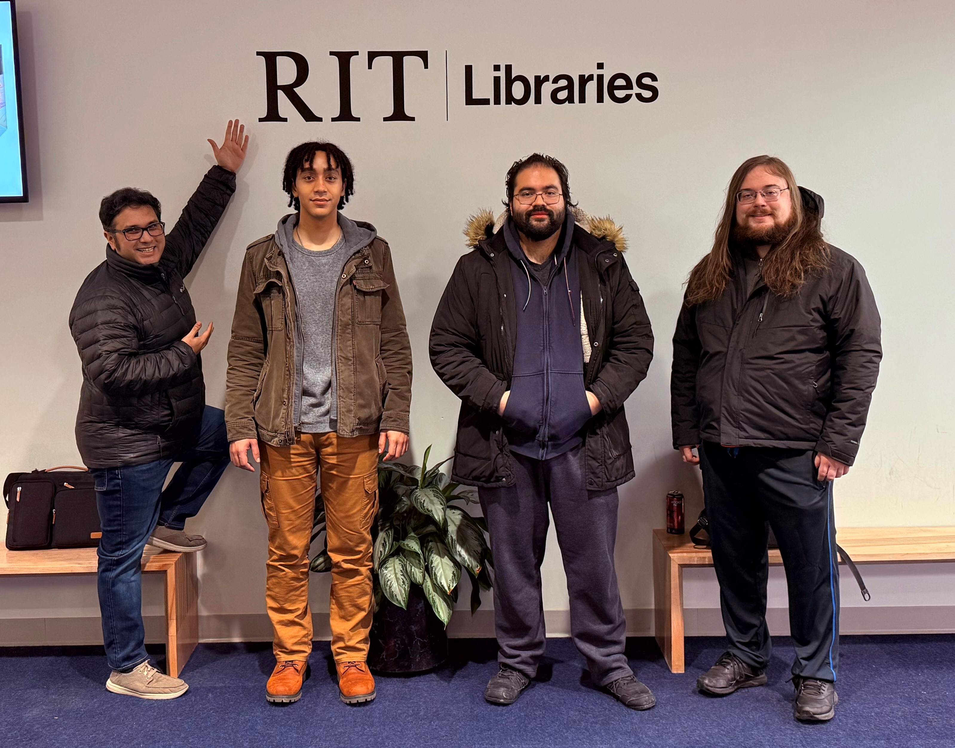 Photo of AFRL/Griffiss Institute research interns Kevin Barkevich, Cedric Bone, Michael Peechatt, and Rodney Sanchez.