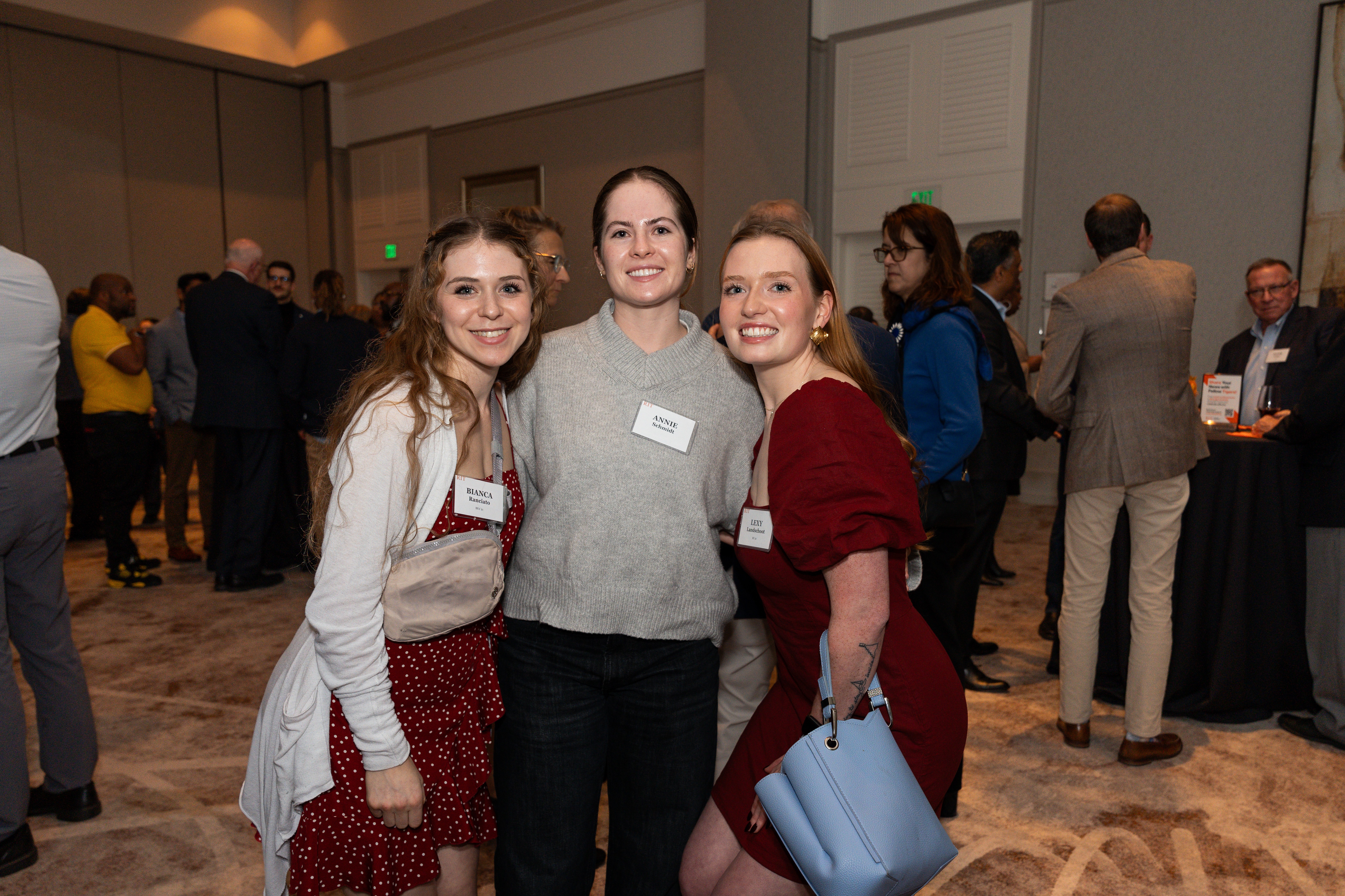 RIT alumni posing for a picture at the RIT Rising event in Atlanta, GA