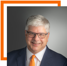 Portrait of Bill Sanders with an orange RIT border around it