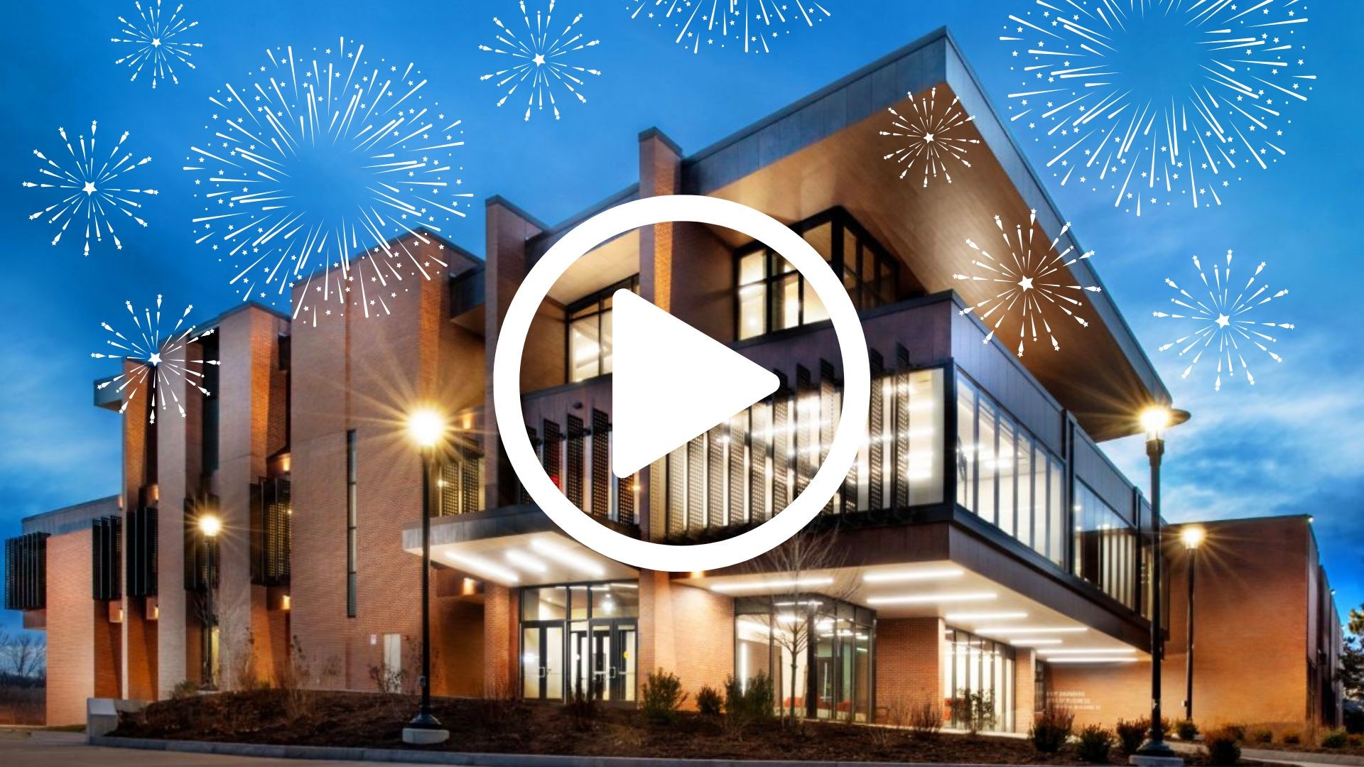 Saunders College of Business building exterior with fireworks and a play button