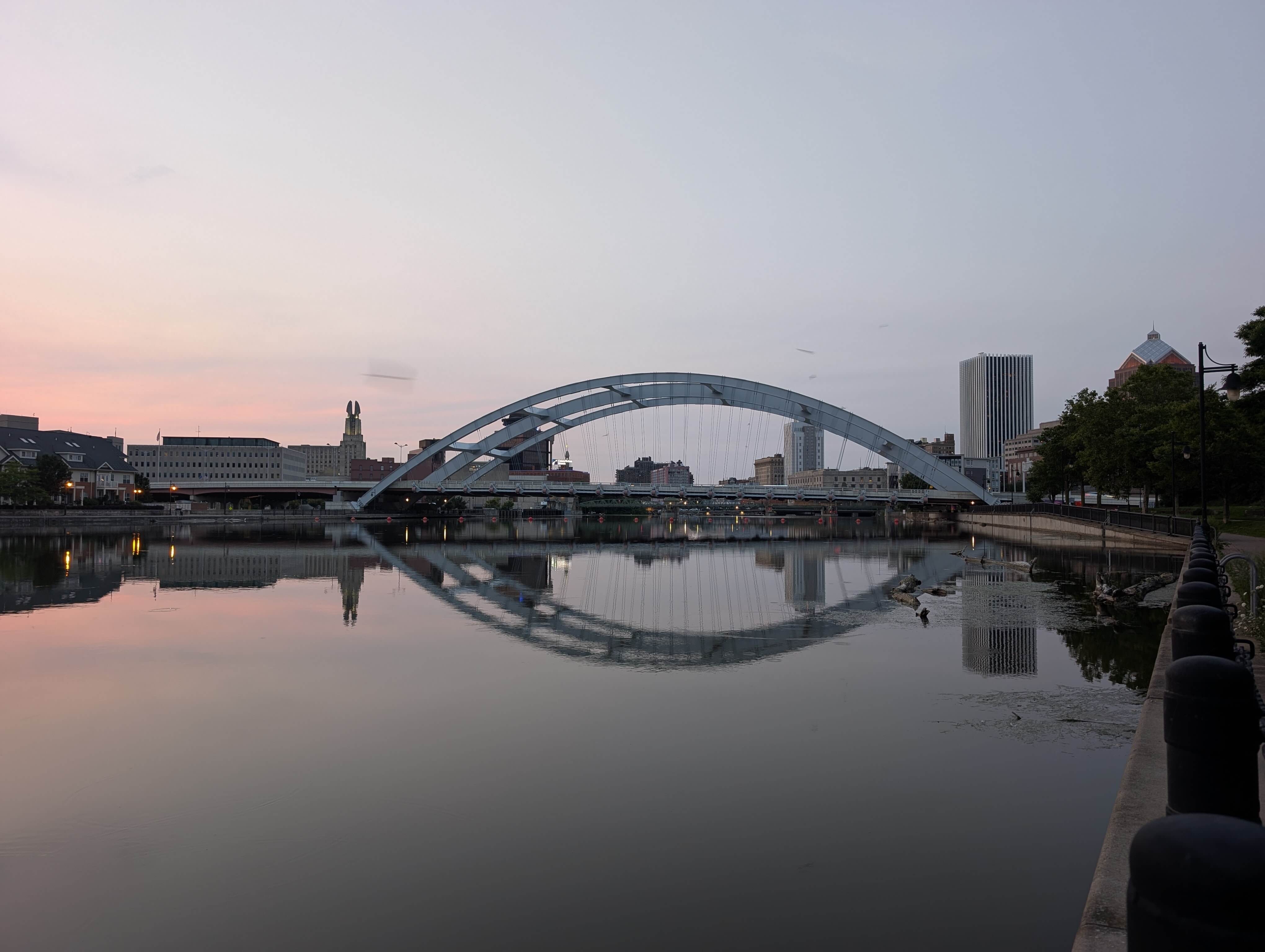 Frederick Douglass–Susan B. Anthony Bridge over the Genesee River at dusk.