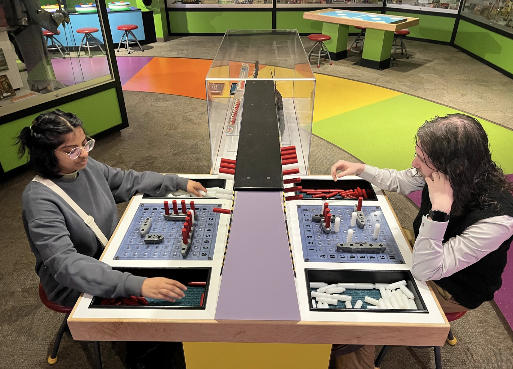 MS student Liya Thomas and PhD student Will Gebhardt playing a game of Battleship at the Strong National Museum of Play.