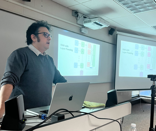 Michael Peechatt presenting his research talk.