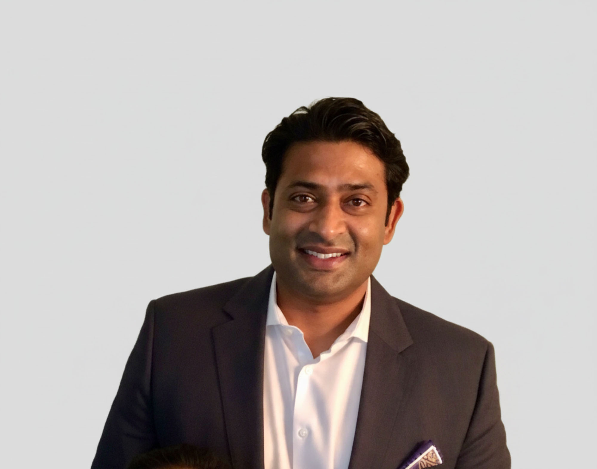 Sudhir Ravi's smiling headshot