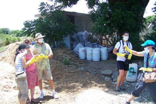 People posing for camera outside