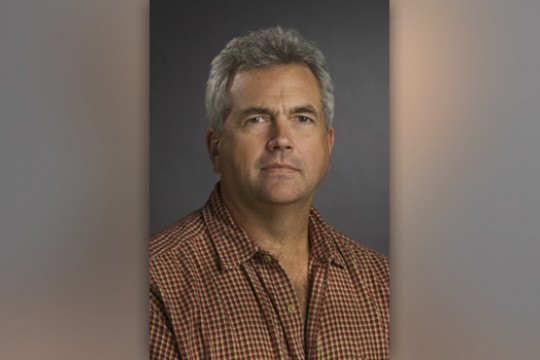 Professor posing for camera