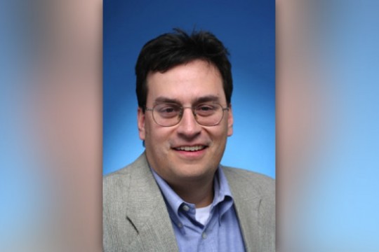 Professor posing for camera