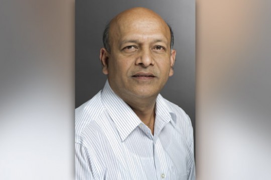 Professor posing for camera