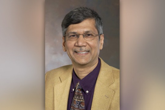 Professor posing for camera