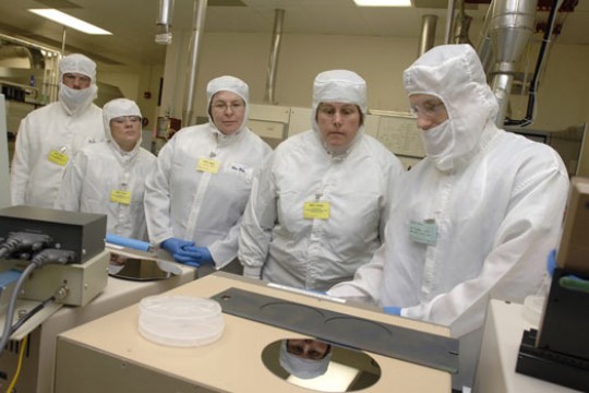 Teachers observing manufacturing process