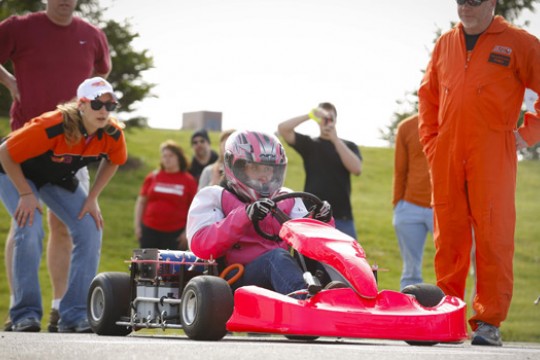 People gathered around car