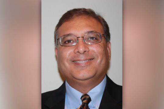 Professor posing for camera