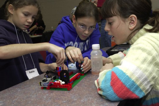 Children building robot