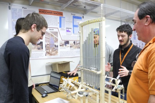 People working around machine