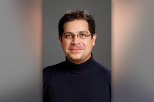 Professor posing for camera