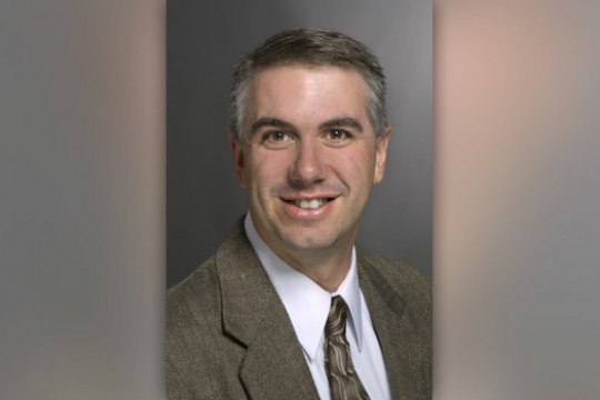 Professor posing for camera