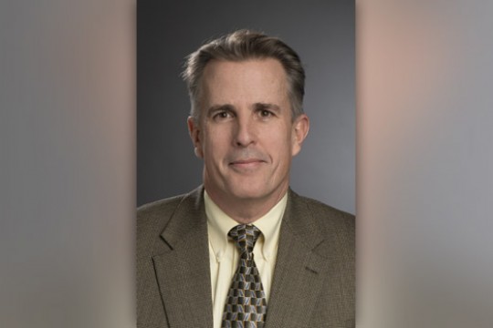 Professor posing for camera