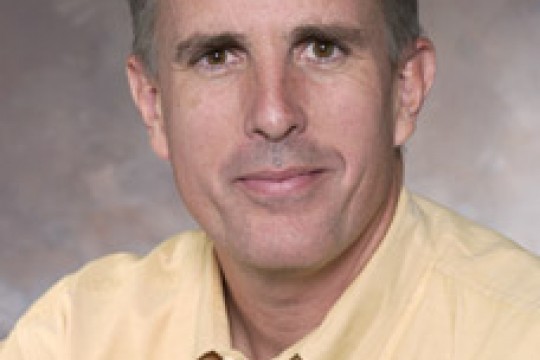 Professor posing for camera