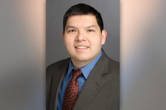 Professor posing for camera