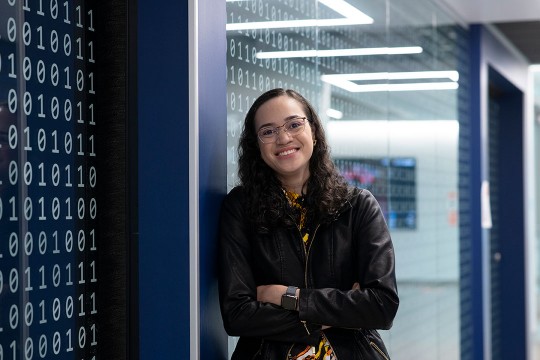 environmental portrait of student Joanna C. S. Santos.