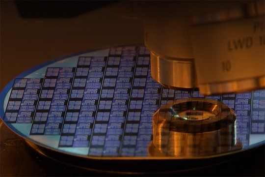 close-up of a semiconductor chip under a microscope.
