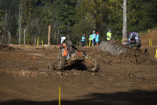 RIT’s Baja team vehicle, driven by fifth-year electrical engineering student Nick Lee, battles through obstacles during the SAE event in Ohio. 