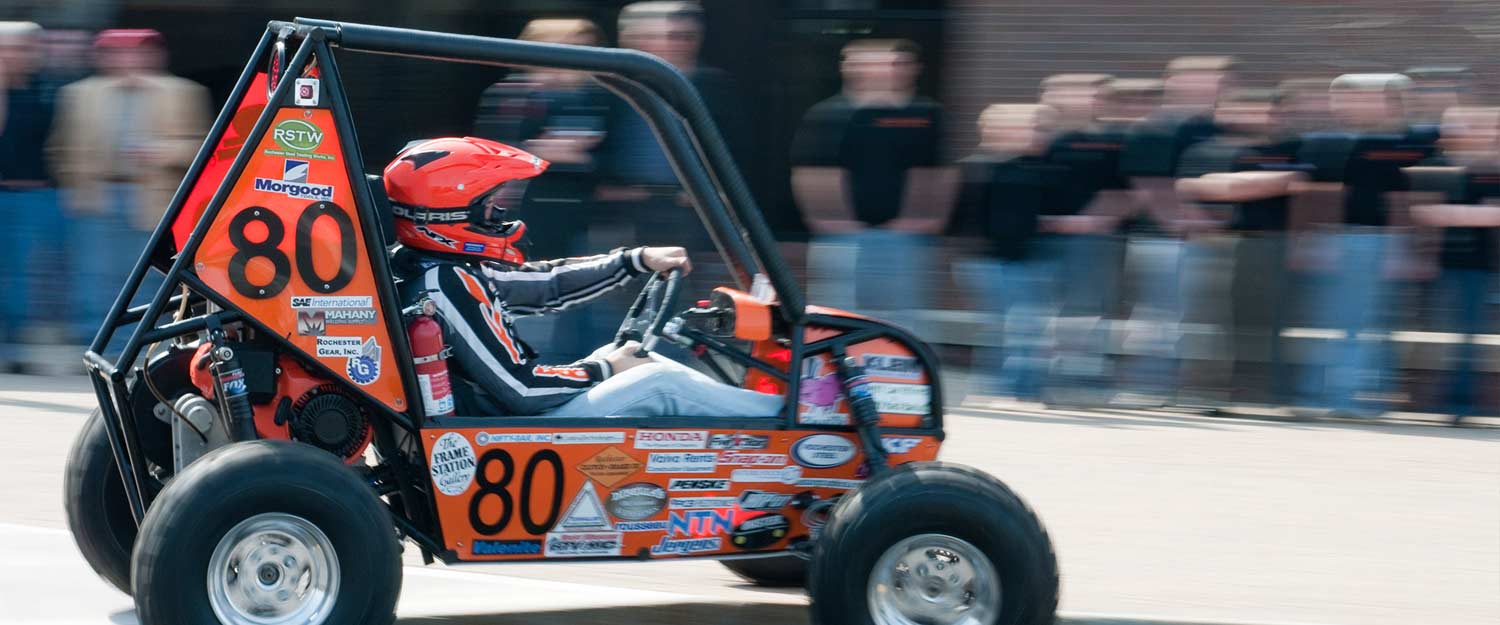 A racer in a small go-cart